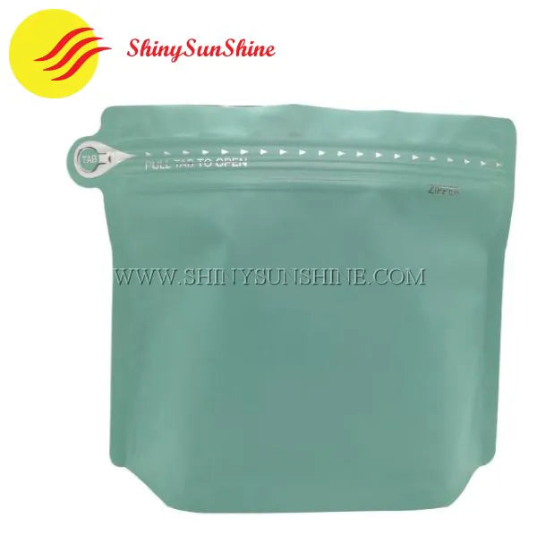 Zip-lock coffee pouch featuring matte finish, gusseted bottom, and printed branding