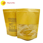 Set of custom brown Kraft paper stand-up bags displayed together