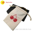 Reusable cotton tote bag with sturdy handles for shopping