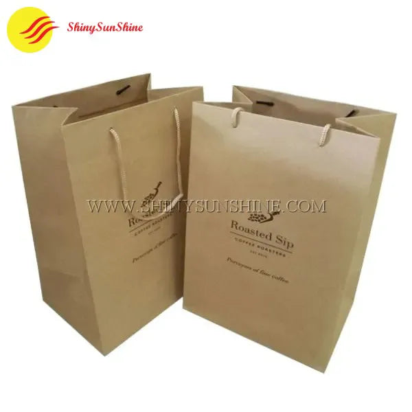 Elegant kraft paper gift bag with custom logo and durable handles — perfect for retail or events