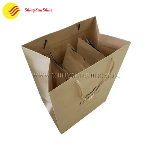 Brown kraft paper shopping bag featuring sturdy handles and personalized branding