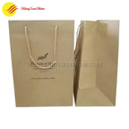 Rustic kraft paper tote with custom design and strong carry handles