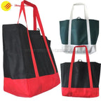 Set of custom foldable non-woven tote bags in assorted colors, perfect for giveaways