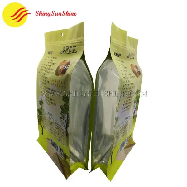 Set of laminated flat bottom pouches for food packaging, featuring various sizes and finishes