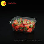 Clear plastic container with strawberries 