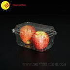 Clear plastic container with apples