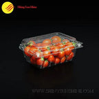 Clear plastic container with tomatoes 