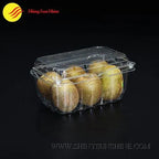 Clear plastic container with kiwis