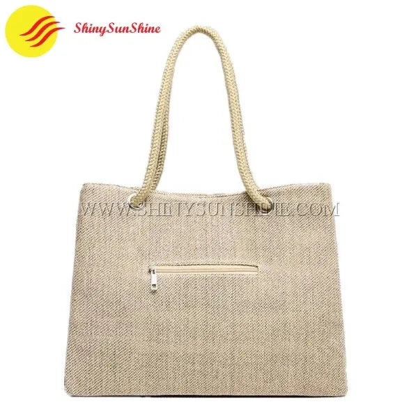 Front of a Custom high quality jute shopping tote bag with sturdy handles.