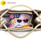 Durable natural jute fiber tote bag with reinforced seams and spacious interior