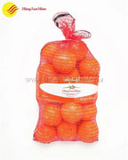 Custom mesh food packaging bag photographed in retail setting with product inside