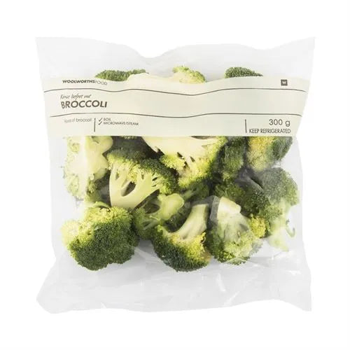 Clear plastic bag filled with fresh vegetables, showcasing custom brand logo and ziplock seal