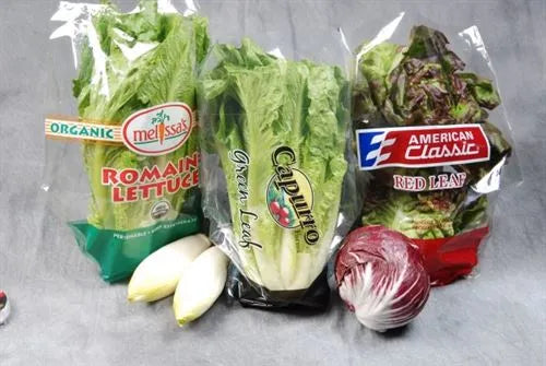 Custom vegetable packaging bag photographed in retail setting with colorful produce inside
