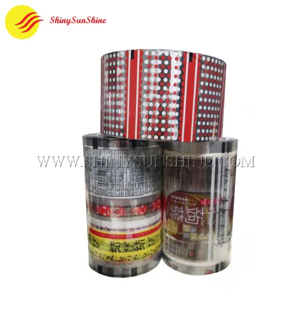 Assorted custom-printed plastic roll film bags showcasing different brand styles and colors