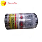 Plastic roll film bag with custom print being used to wrap retail product
