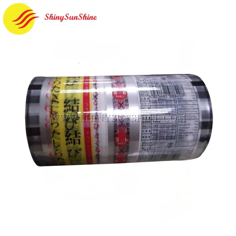 Plastic roll film bag with custom print being used to wrap retail product