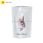 Custom pet food pouch photographed upright with bold branding and nutritional info panel