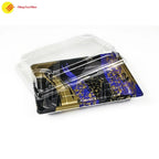 Empty clear plastic sushi container with black base and snap-on lid