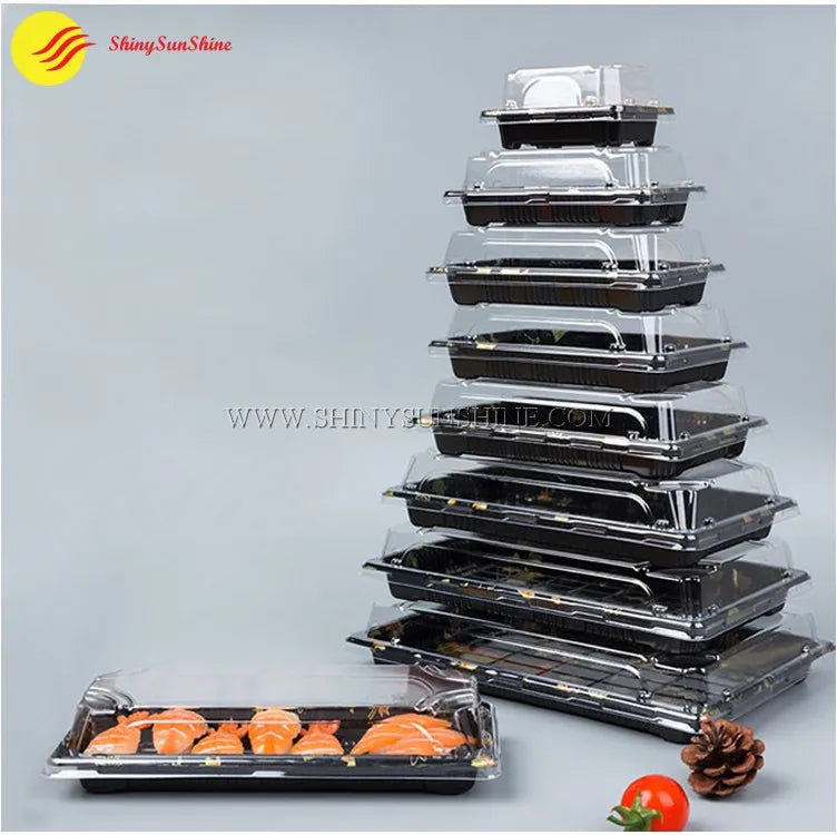 Empty clear plastic sushi container with black base and snap-on lid