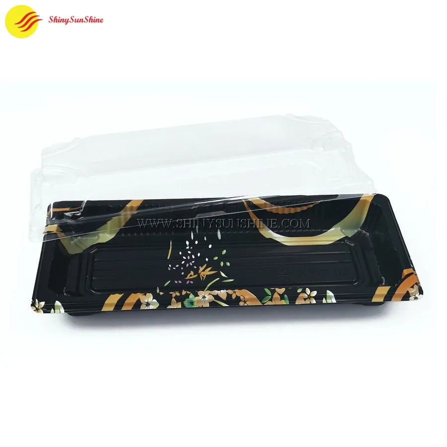 Empty clear plastic sushi container with black base and snap-on lid