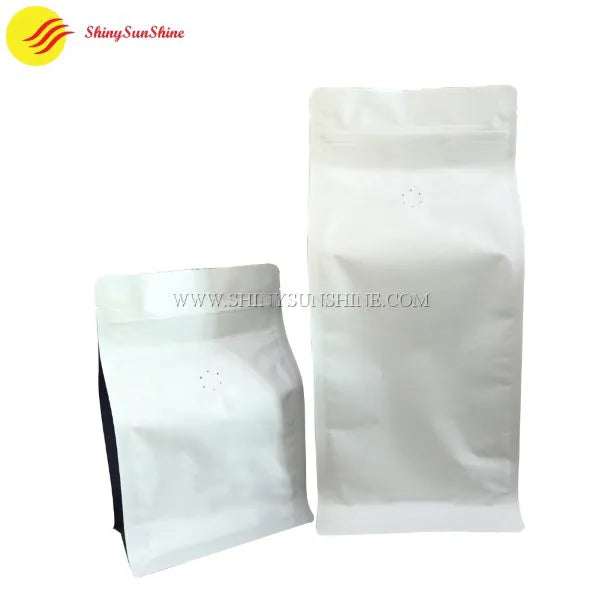 Custom quad-seal aluminum foil stand-up bag with printed branding and reinforced side gussets