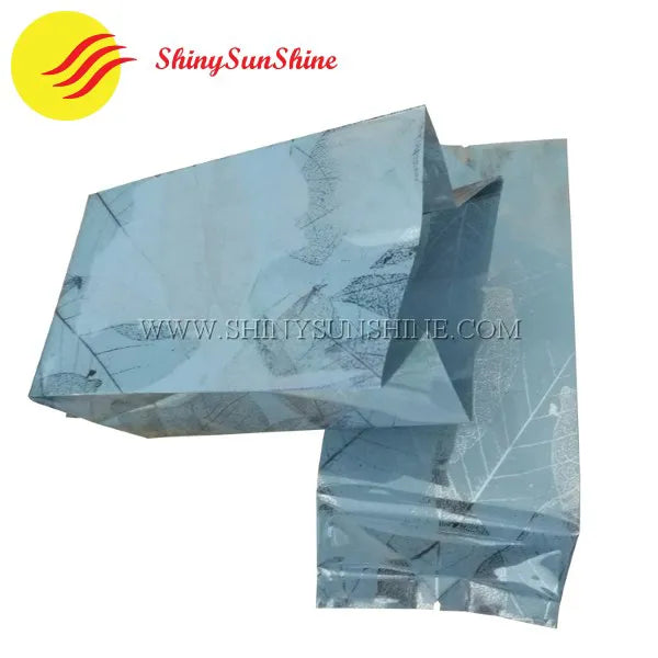 Custom side-gusset mini plastic tea bag with printed label and heat-sealed edges
