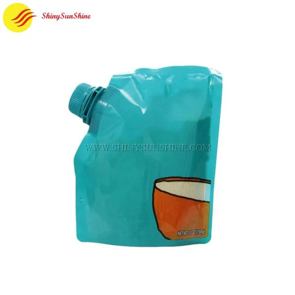 Stand-up juice pouch with ergonomic nozzle, gusseted bottom, and fruit-themed graphics