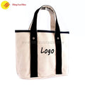 Custom canvas hand tote bag for women with printed branding and sturdy handles