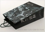Black and gray patterned box with visible branding on a white background