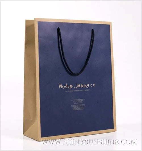Custom-printed paper shopping bag featuring store logo and matte finish