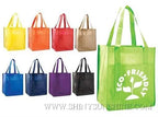 Set of colorful reusable shopping bags with a green bag featuring 'Eco-Friendly' text.