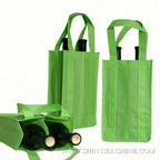 Green folding shopping bag with wheels on a white background